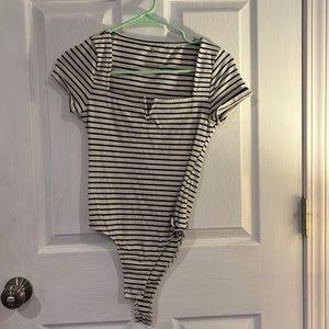 Black and white bodysuit with a square neck line